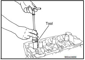 Nissan Maxima. Removal and Installation of Valve Oil Seal