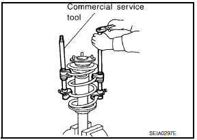 Nissan Maxima. FRONT COIL SPRING AND STRUT